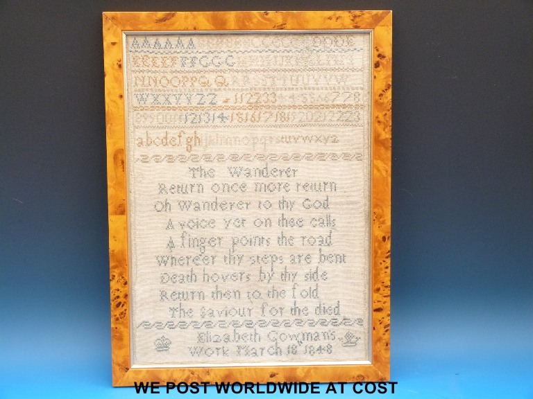 Sampler by Elizabeth Cowmans dated 1848 with lettering and religious poem, framed and glazed.