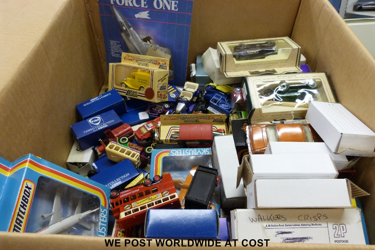 A large quantity of boxed and loose diecast model cars, buses and aeroplanes.