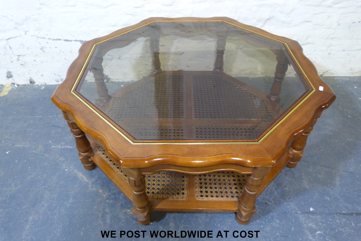 Modern octagonal glazed coffee table with shelf under, width 100 cm.