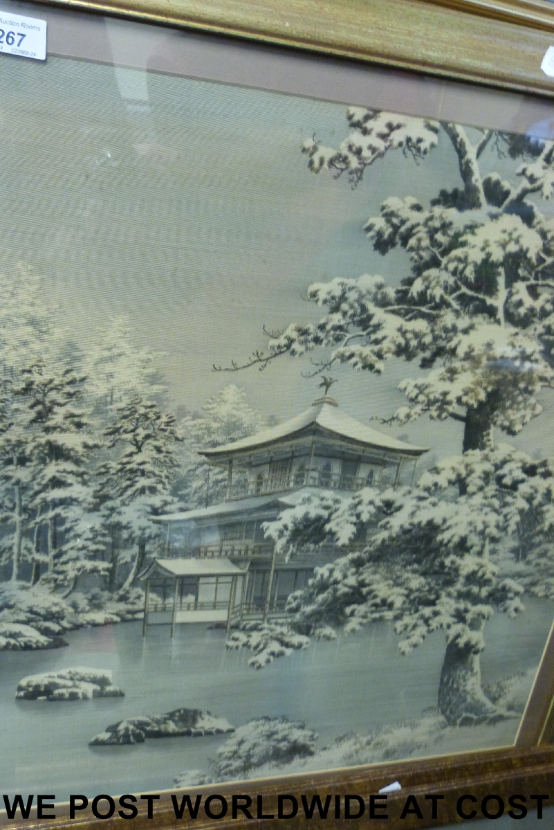 A set of three Oriental silk pictures including two snow scenes.