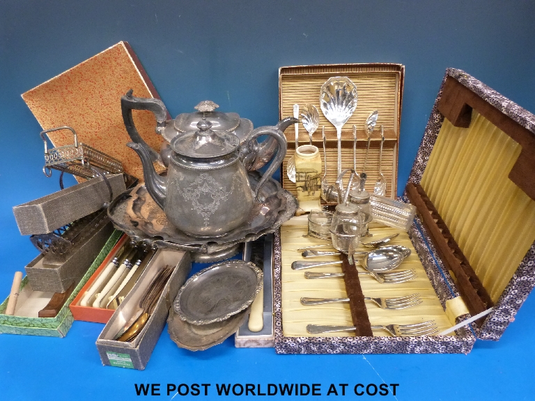 Collection of plated wares including baskets, cutlery, teapot etc