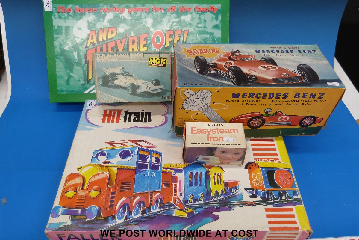 A Mercedes Benz power steering car in original box and other boxed toys