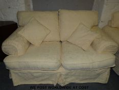 Two two seater sofas with cream loose covers
AUCTIONEER TO ANNOUNCE THERE ARE EACH SOFA ALSO HAS A