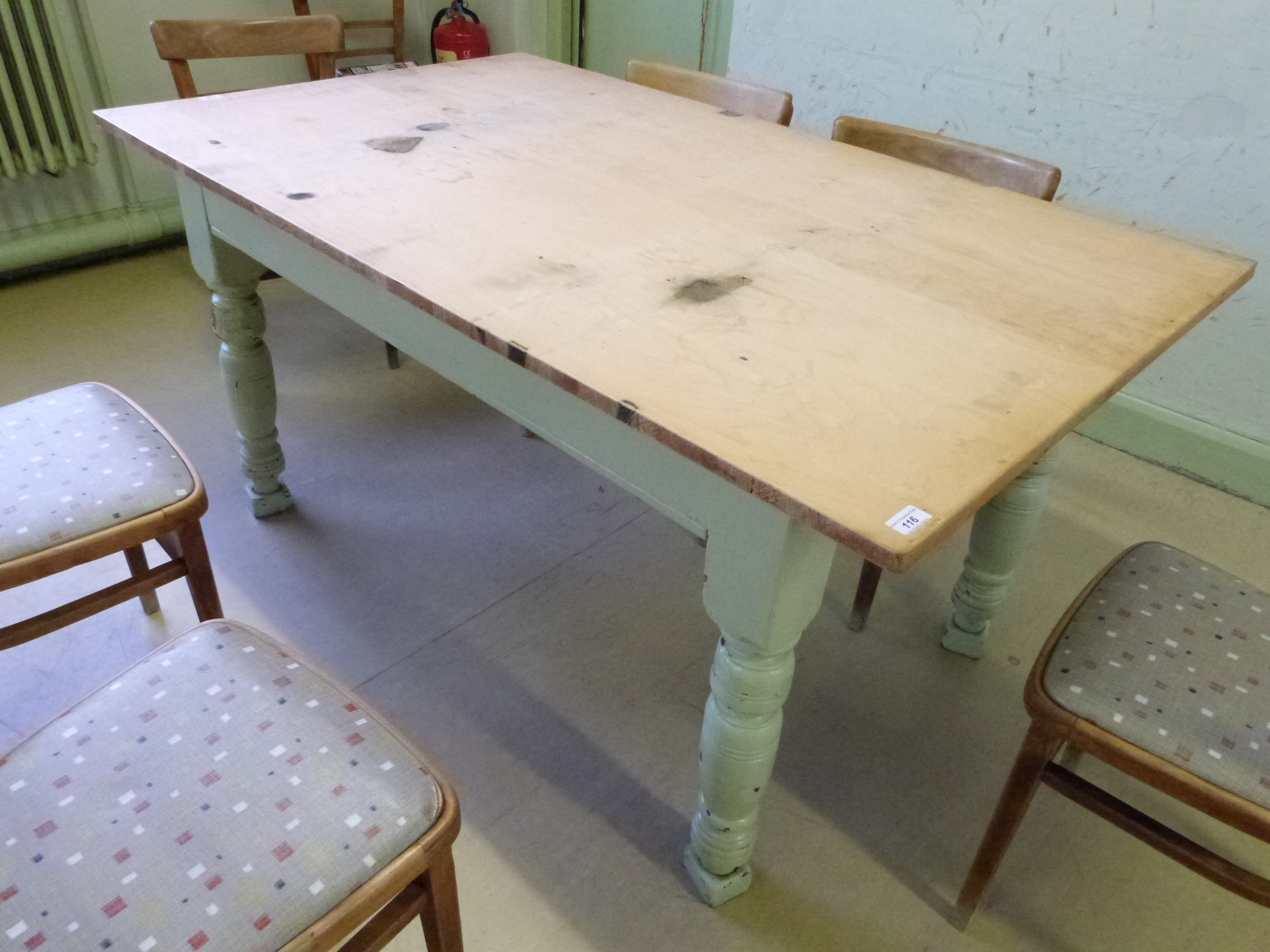A pine kitchen type table raised on turned legs, length 152cm width 92cm height 76cm (on blocks)