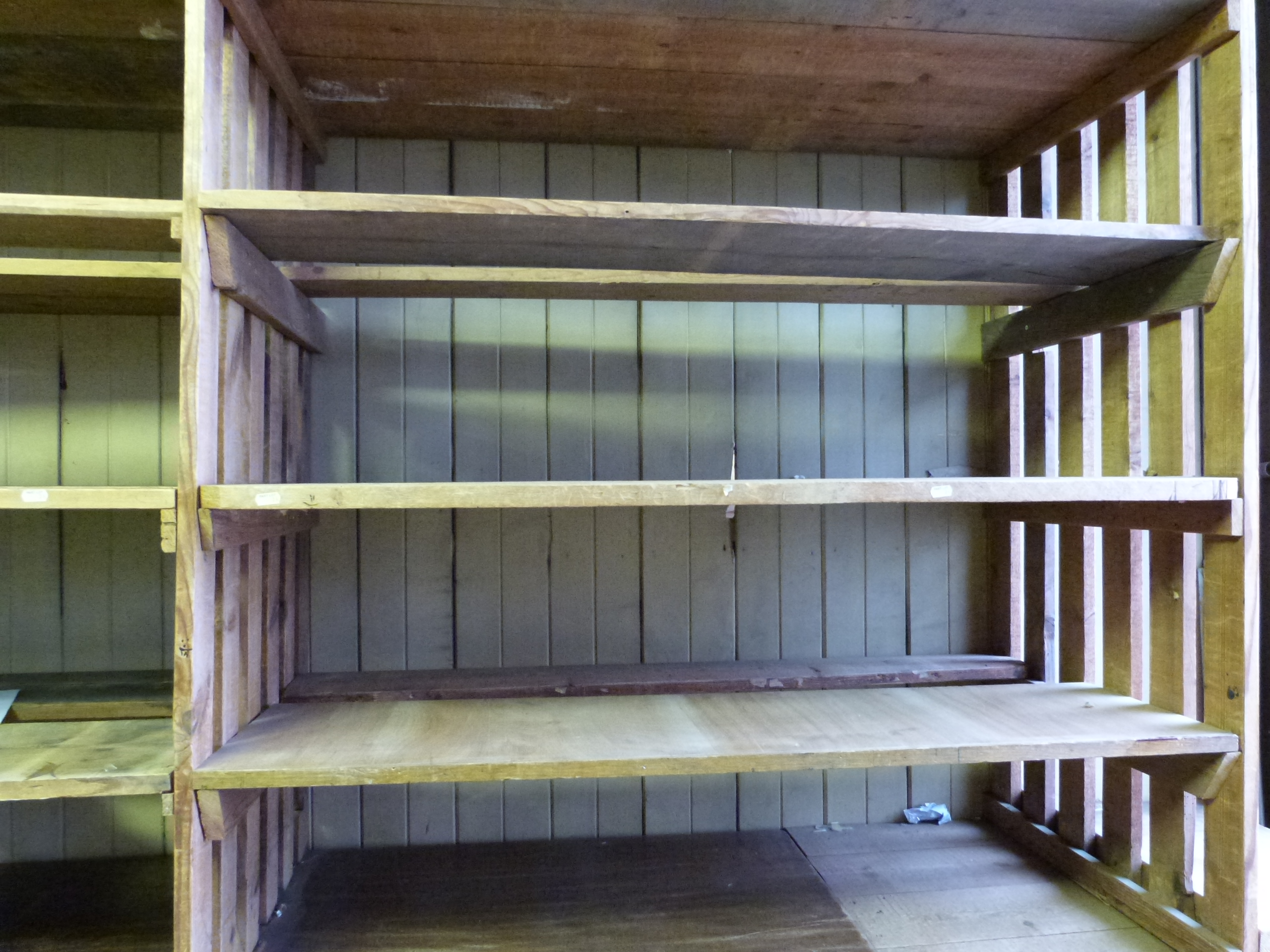 A quantity of mainly slatted design shelving, mostly ceiling height, approximately 15m in total