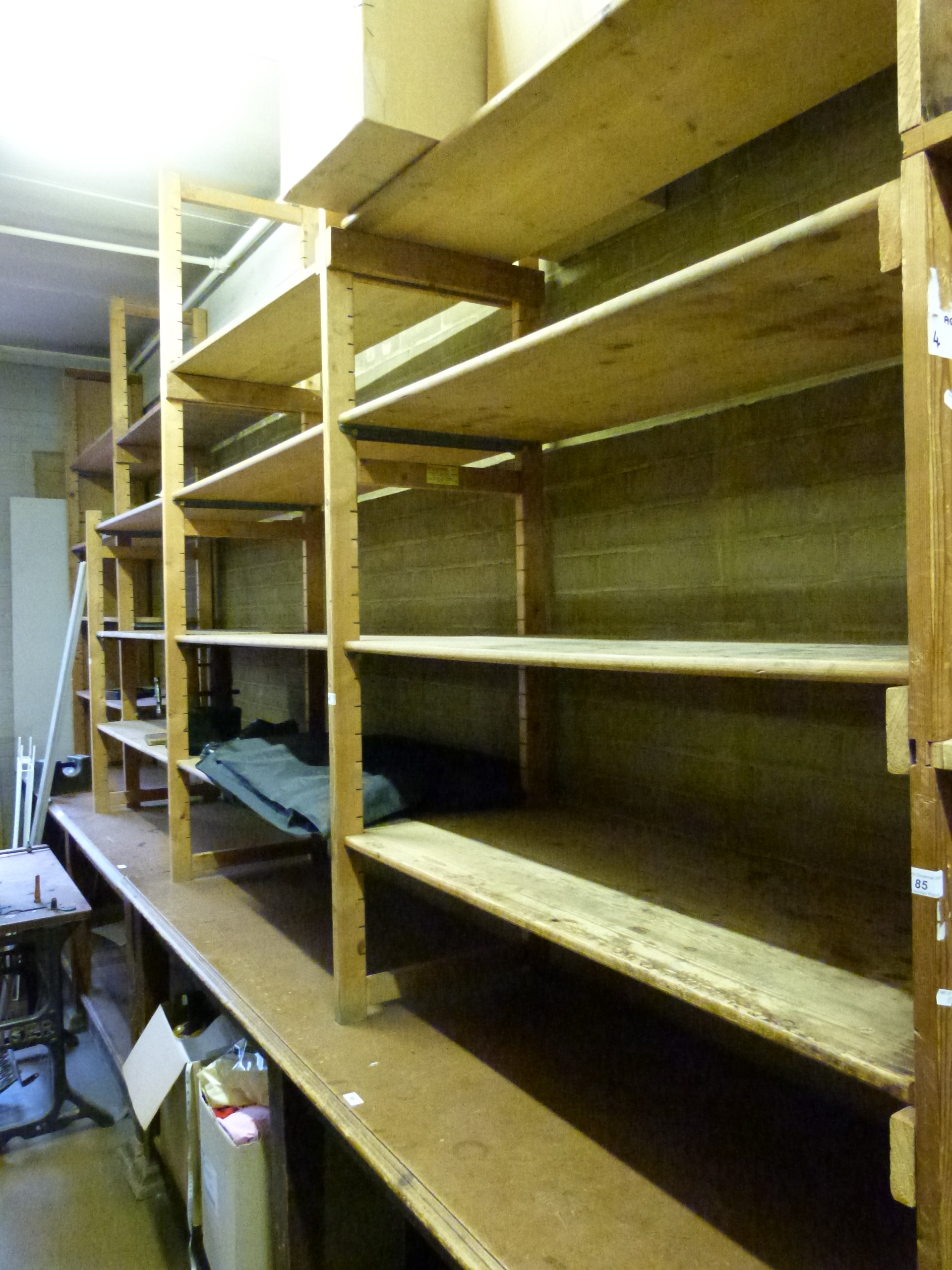 Approximately 4.8m of Bruynzee shelving, mostly 50cm deep but one bay of 40cm depth together with