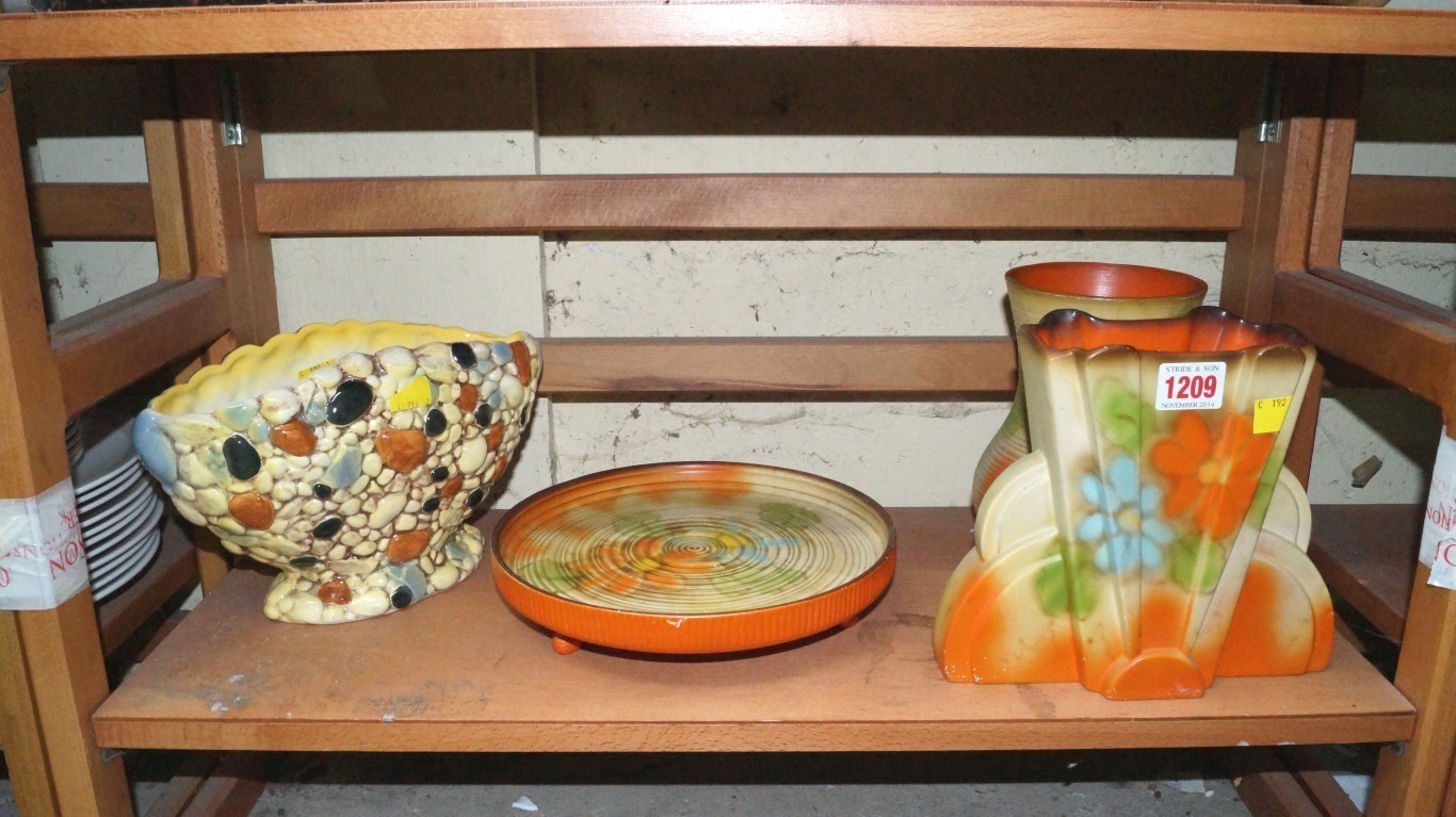 Three pieces of 1930s Sylvac Art Deco pottery; and another later Sylvac pottery vase.    Condition