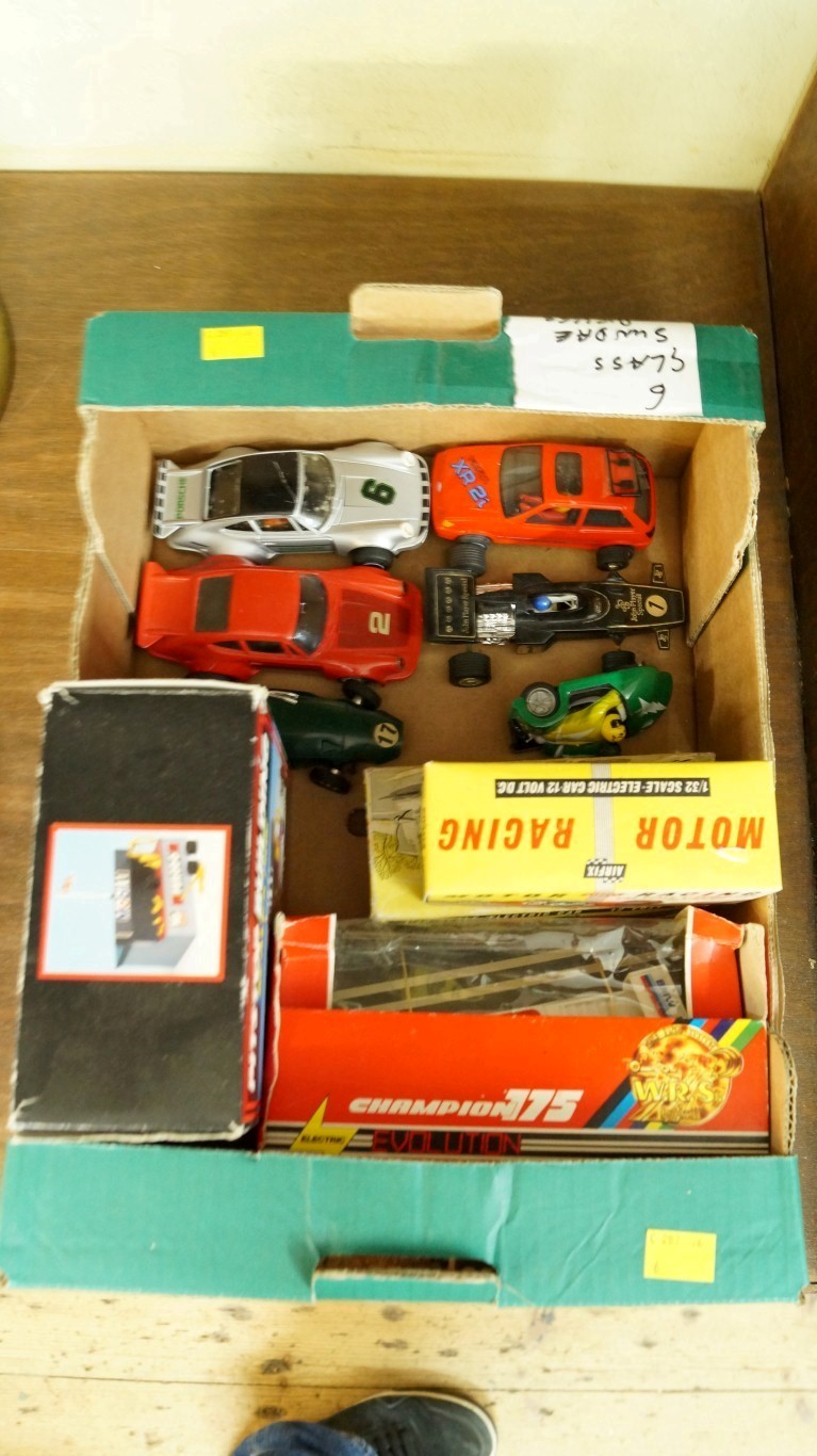 Nine Scalextric vehicles, to include two boxed Airfix examples; and a boxed Scalextric pit stop