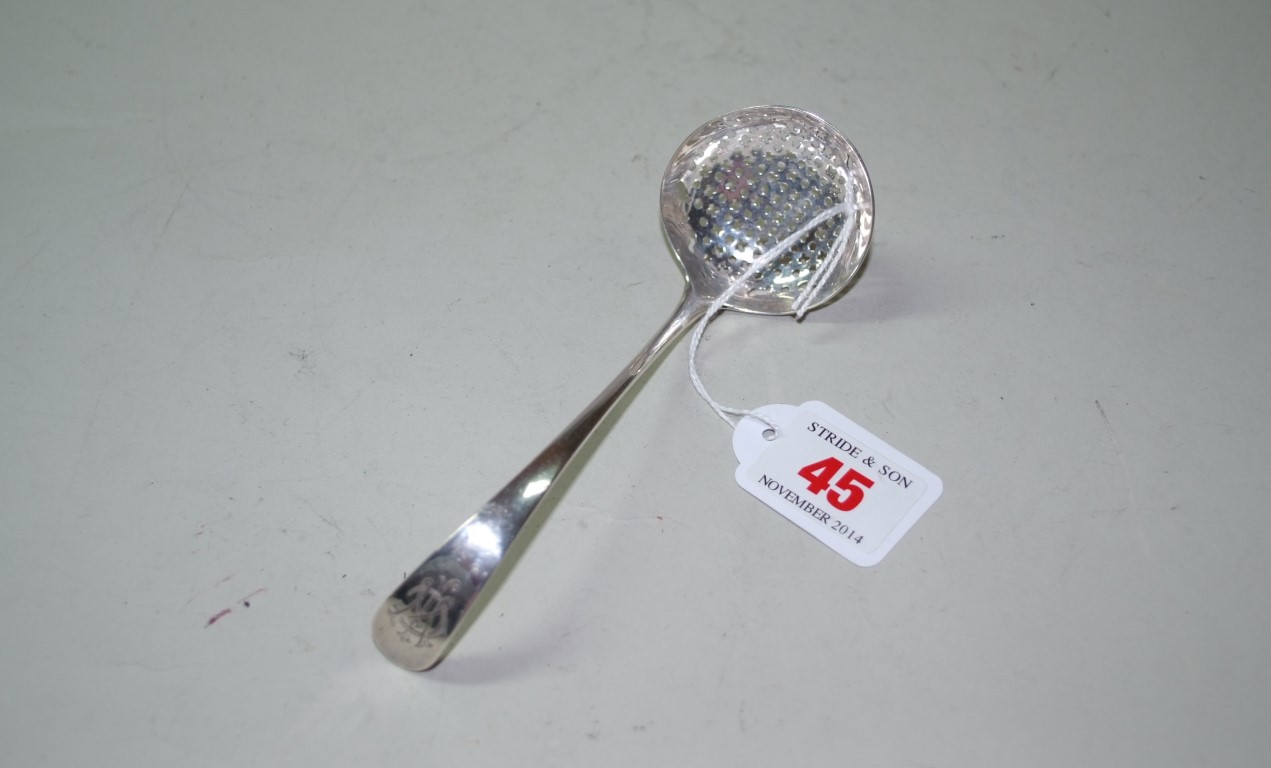 A George III silver Old English pattern sifter spoon, by Hester Bateman, London 1786, 25g, 14cm.