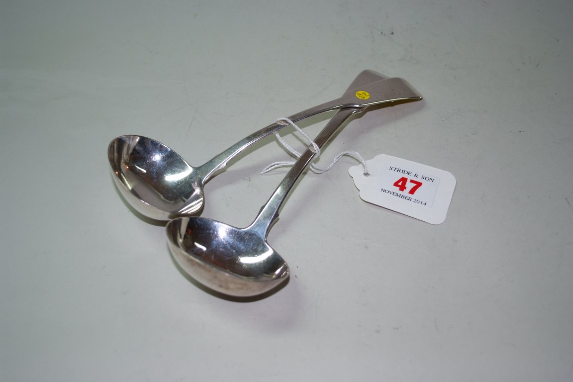 A pair of Victorian Irish silver fiddle pattern sauce ladles, by Samuel Neville, Dublin 1838,