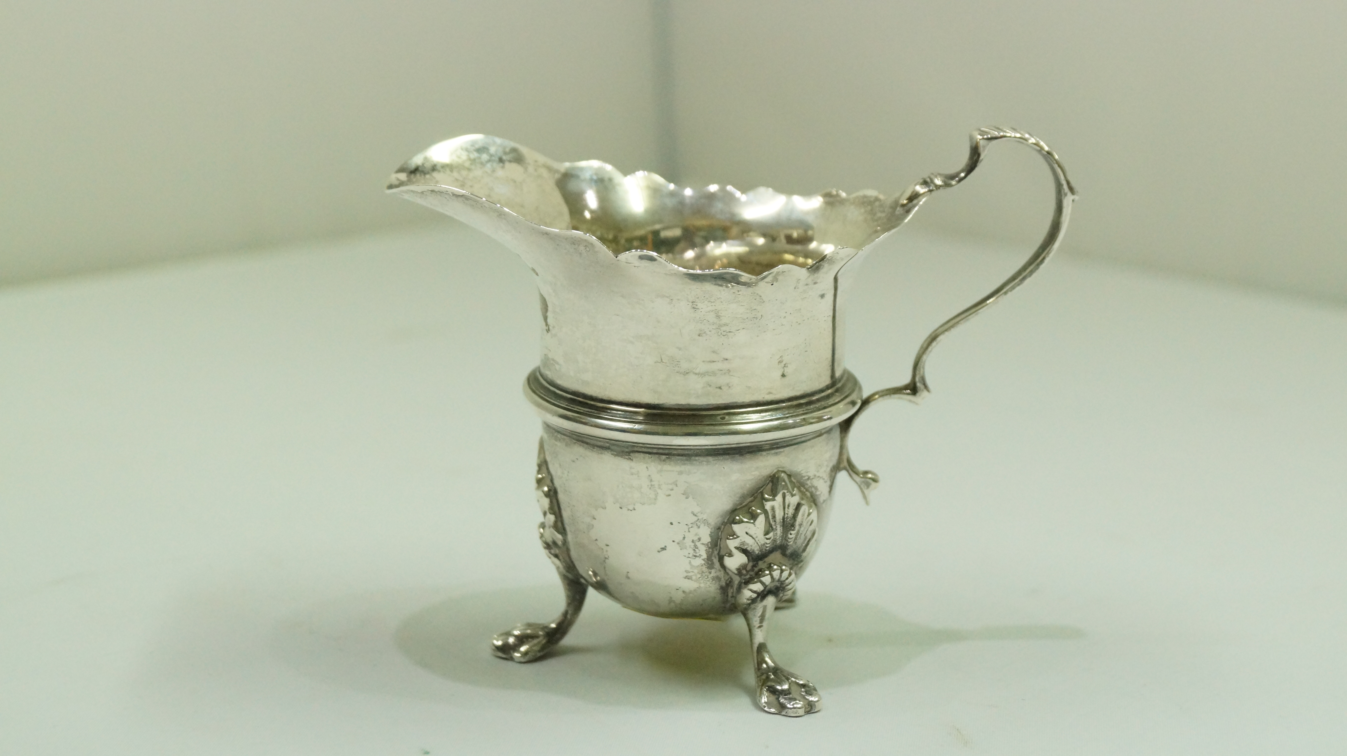 A silver cream jug, by Barker Brothers, Chester, 95g, 9cm.