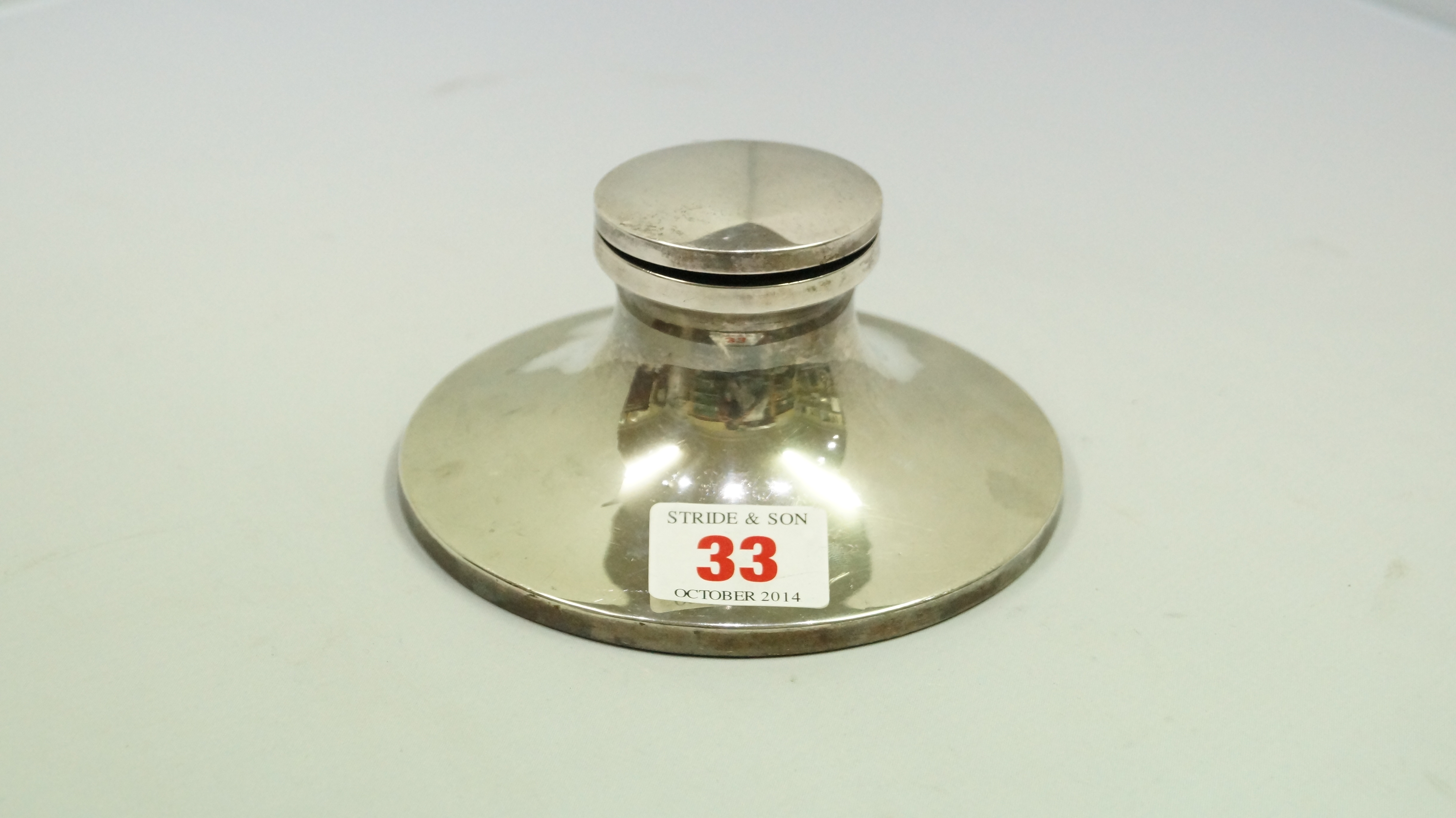 A silver capstan inkwell, Birmingham 1993, weighted, 13cm.