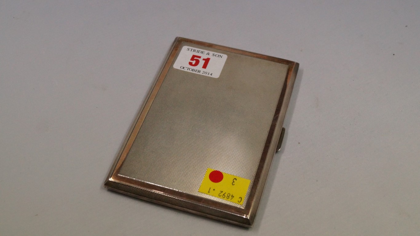 A silver engine turned cigarette case, 12.5cm, 196g.