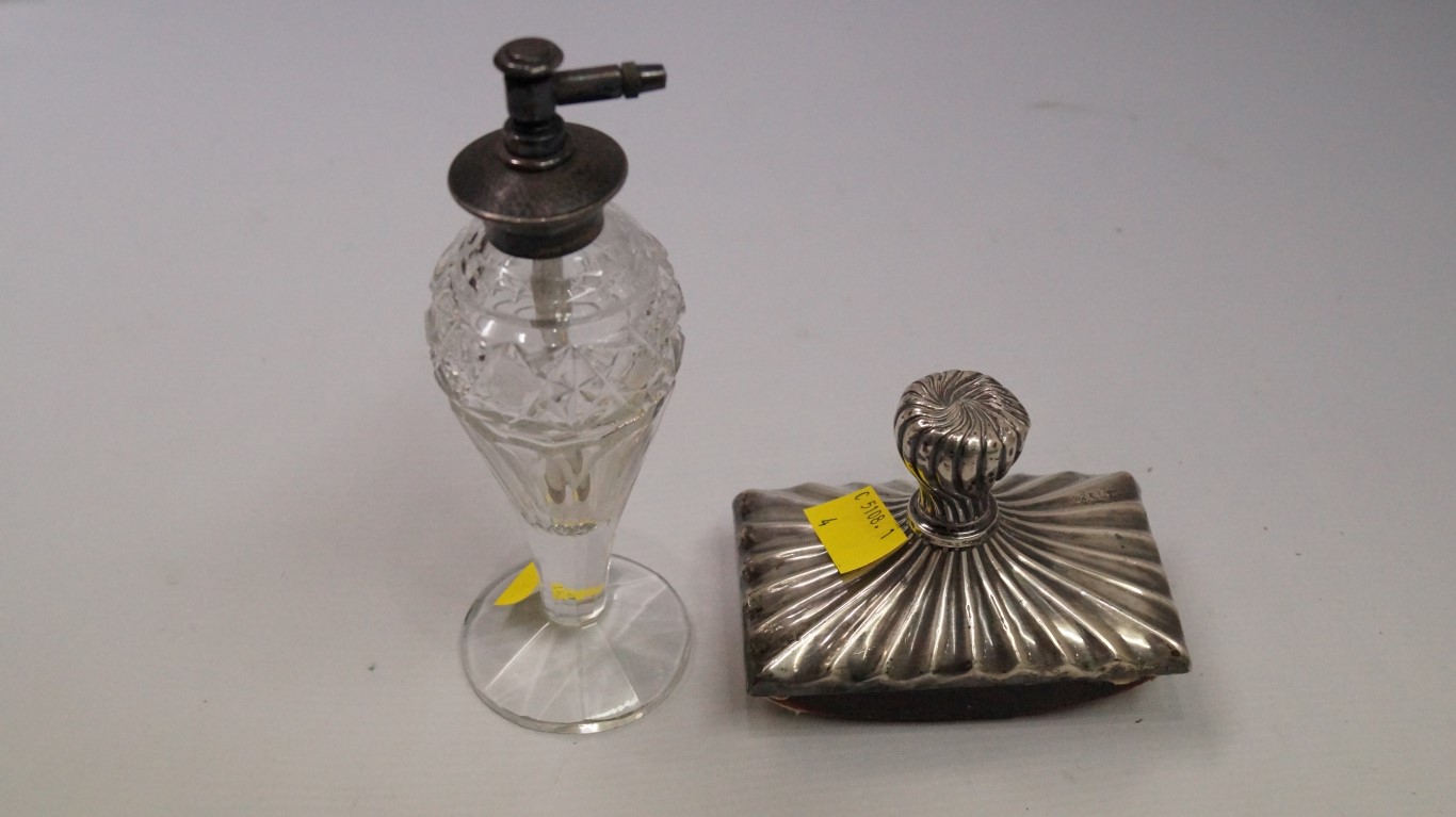 A sterling silver mounted glass atomiser; together with a Victorian silver mounted ink blotter.