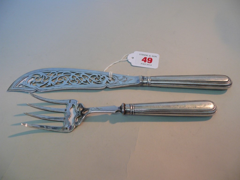 A pair of Victorian silver fish servers, by Martin Hall & Co, Sheffield 1881.     Condition Report: