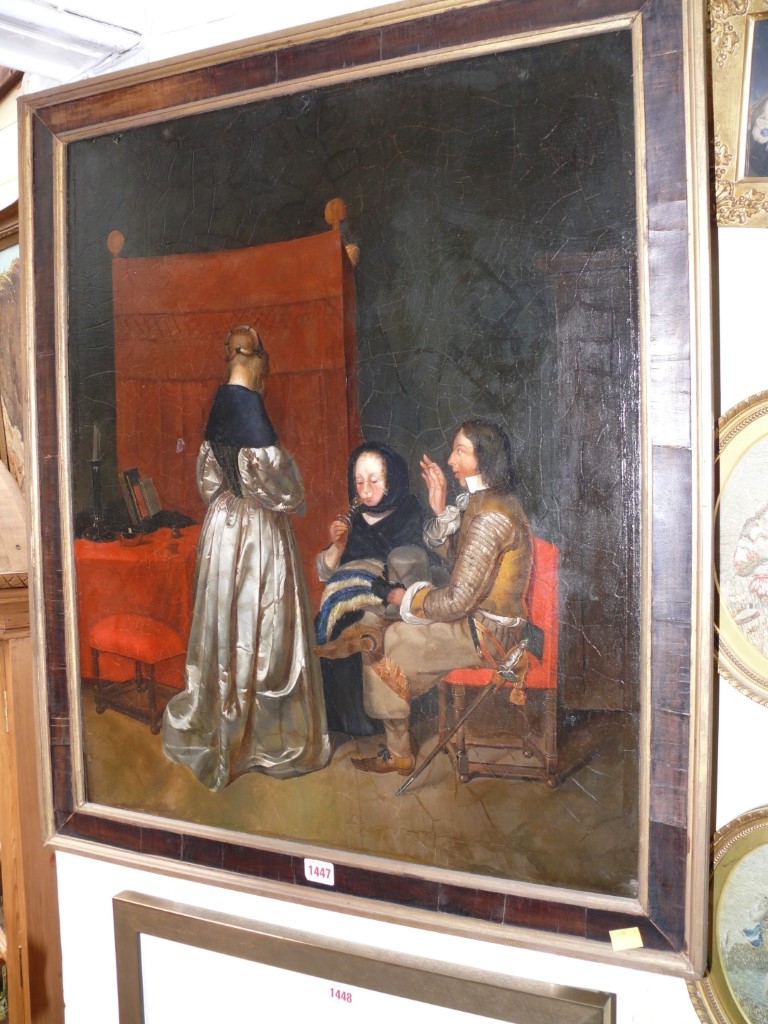 Flemish School, 17th century, figures in an interior, unsigned, oil on canvas, 69.5 x 59cm.