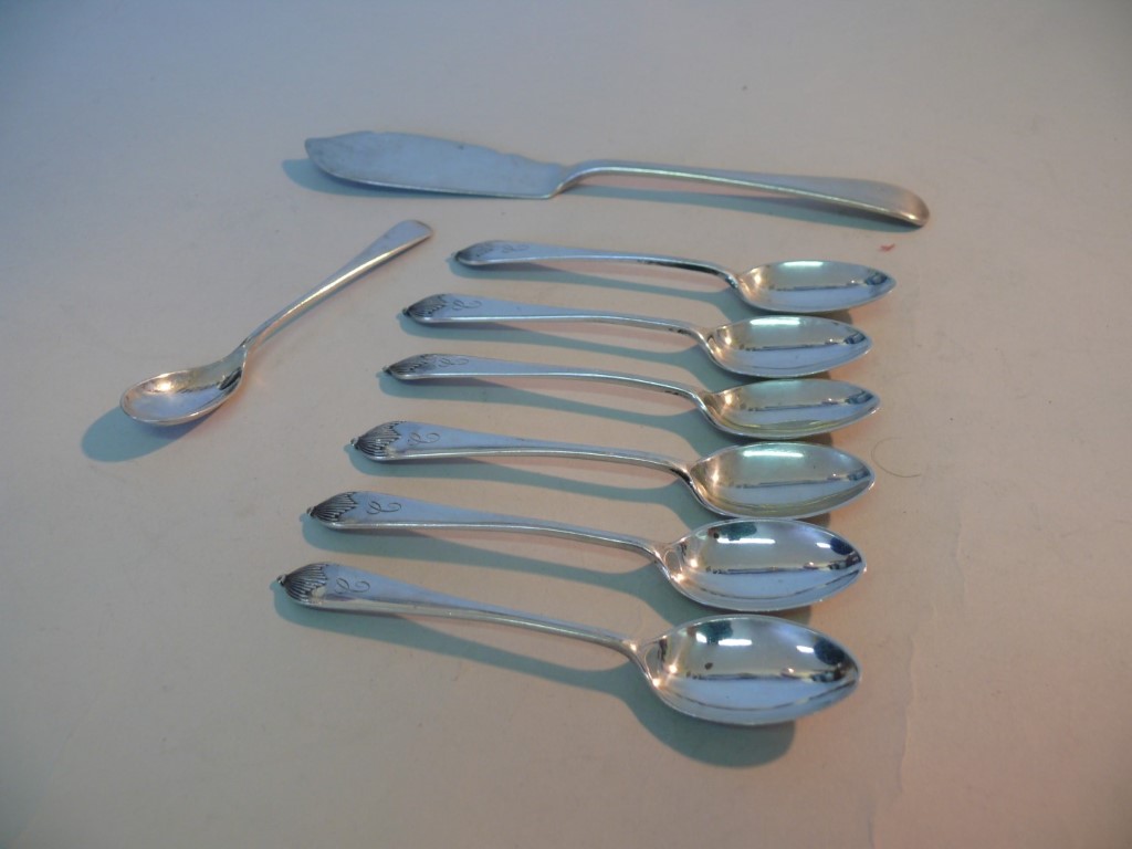 A set of six silver coffee spoons, by W W H C, Sheffield 1902; together with a silver jam spoon; and