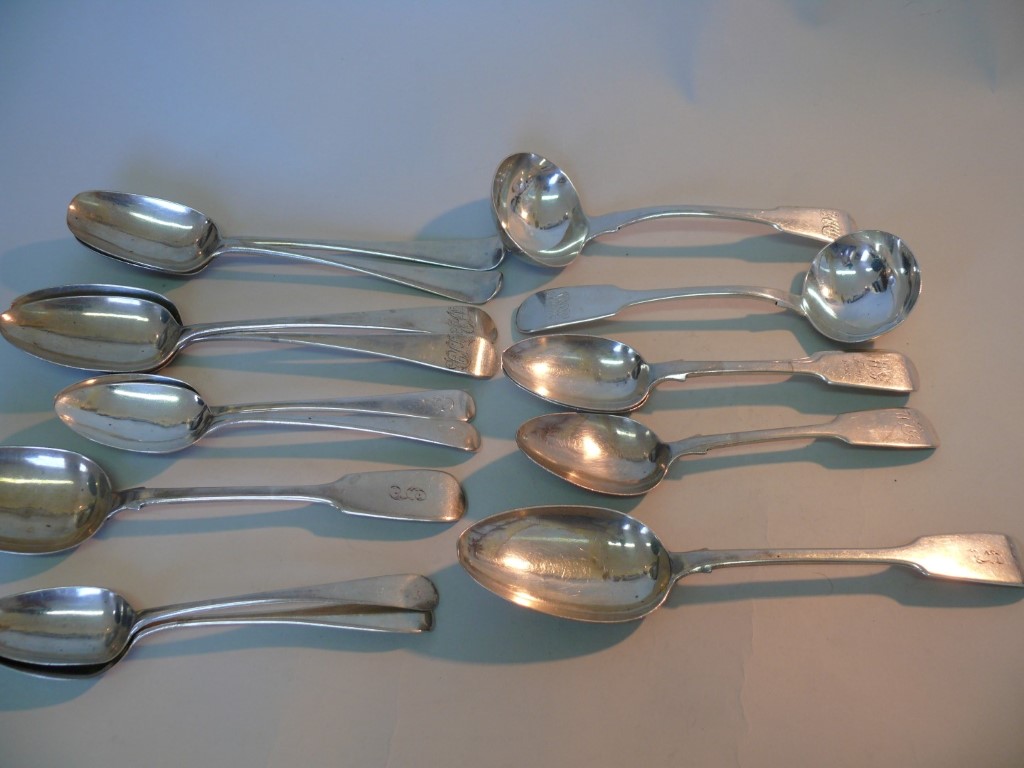 A quantity of Georgian and later silver cutlery, to include two fiddle pattern sauce ladles, 786g.