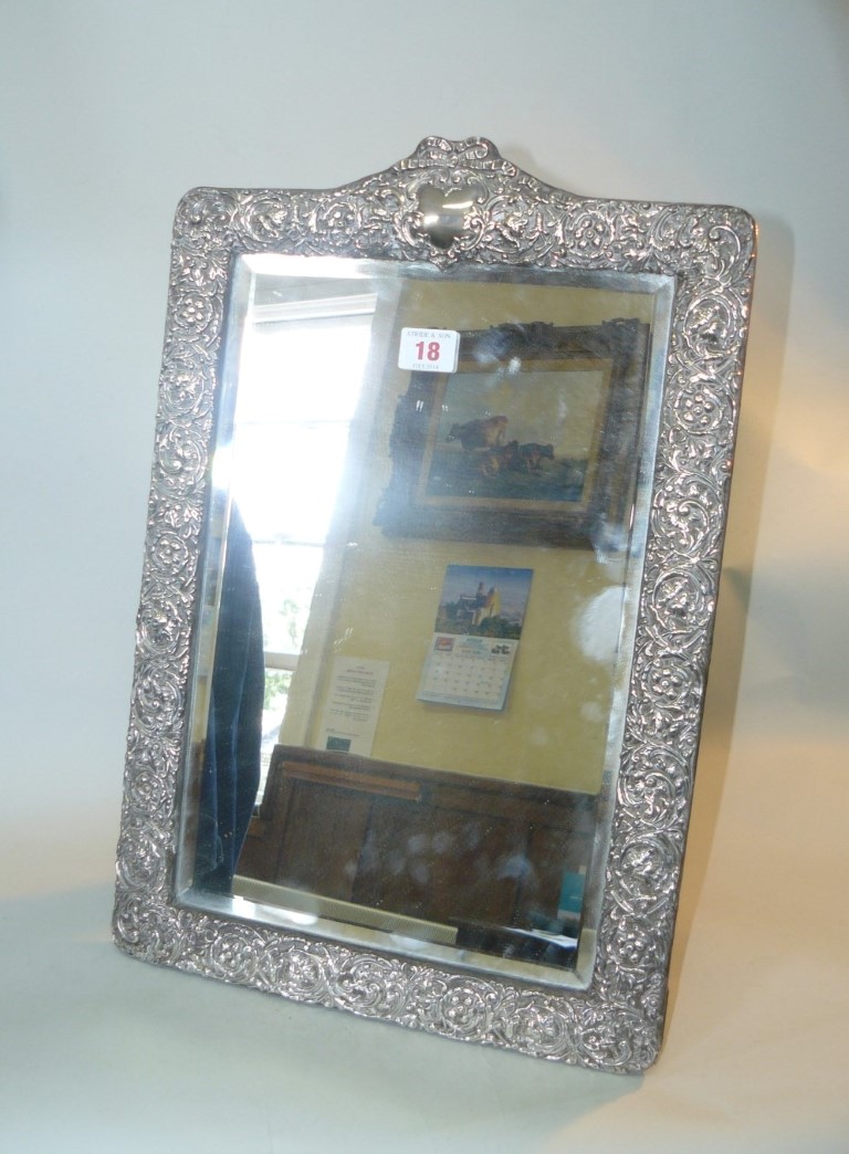 An Edwardian silver large rectangular easel mirror, by H Matthews, Birmingham 1907, 48cm high.