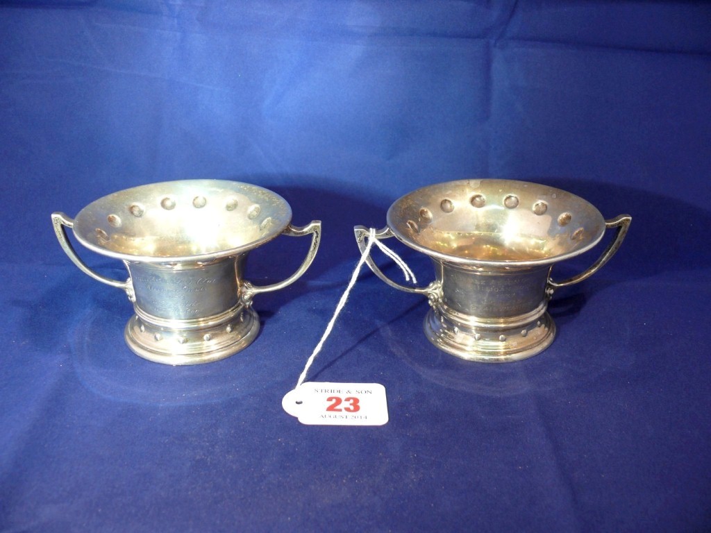 A pair of silver twin handled trophy cups, by Barker Brothers Silver Ltd, Birmingham, 6cm, 231g.