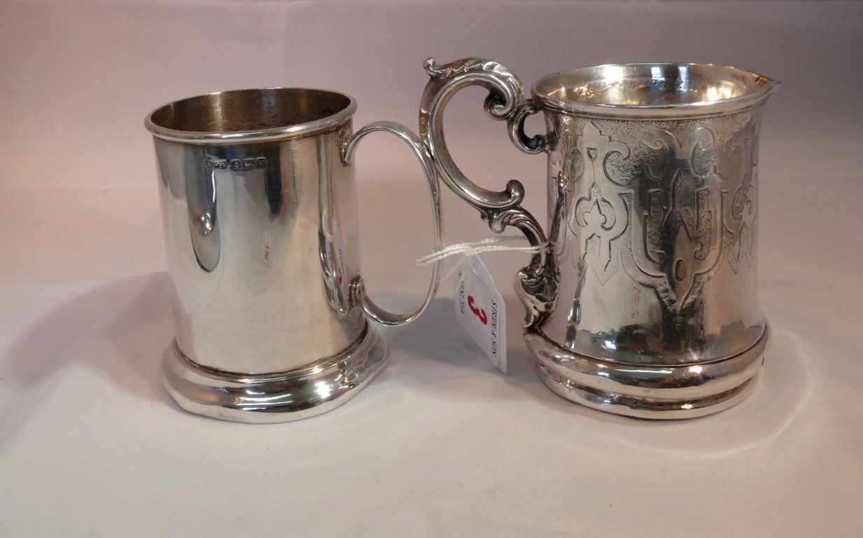 A silver christening mug, by E.J Houlston, Birmingham 1920, 8cm; together with another tankard,