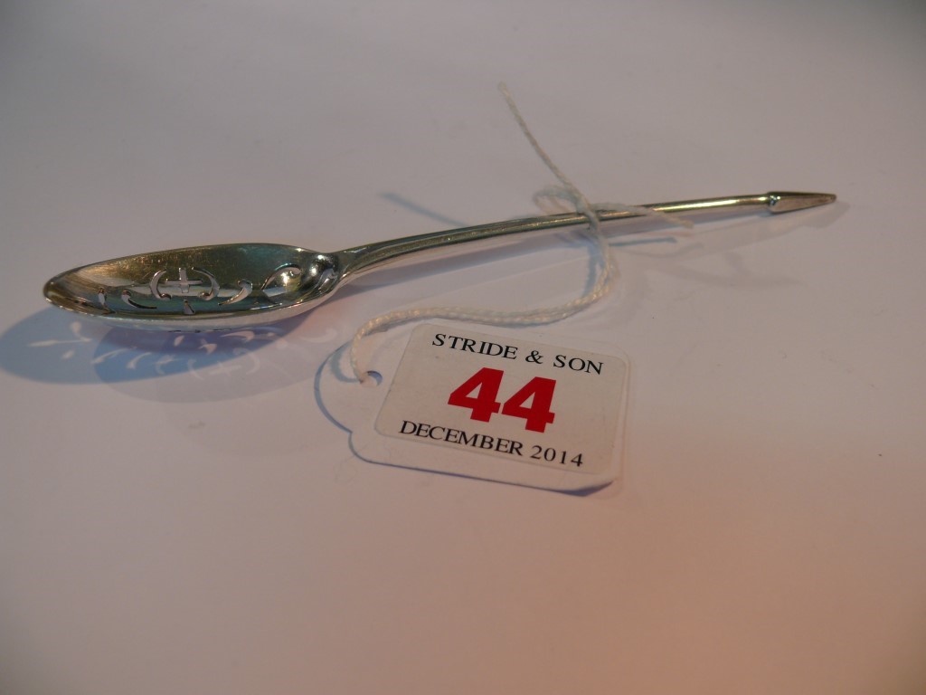 An 18th Century silver mote spoon, by W.