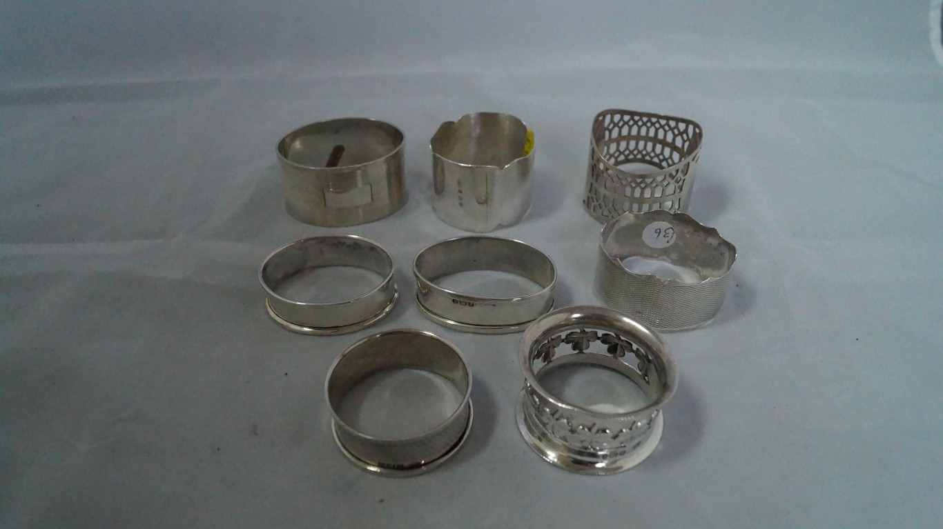 Eight various silver napkin rings, 182g.
