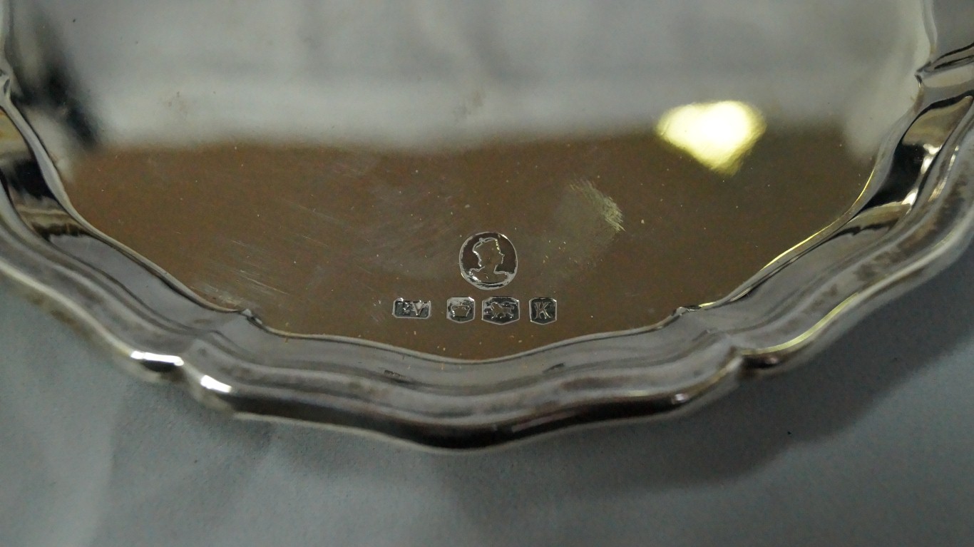 A cased silver card tray, by Viners, Sheffield 1952, 15cm, 209g. - Image 2 of 2