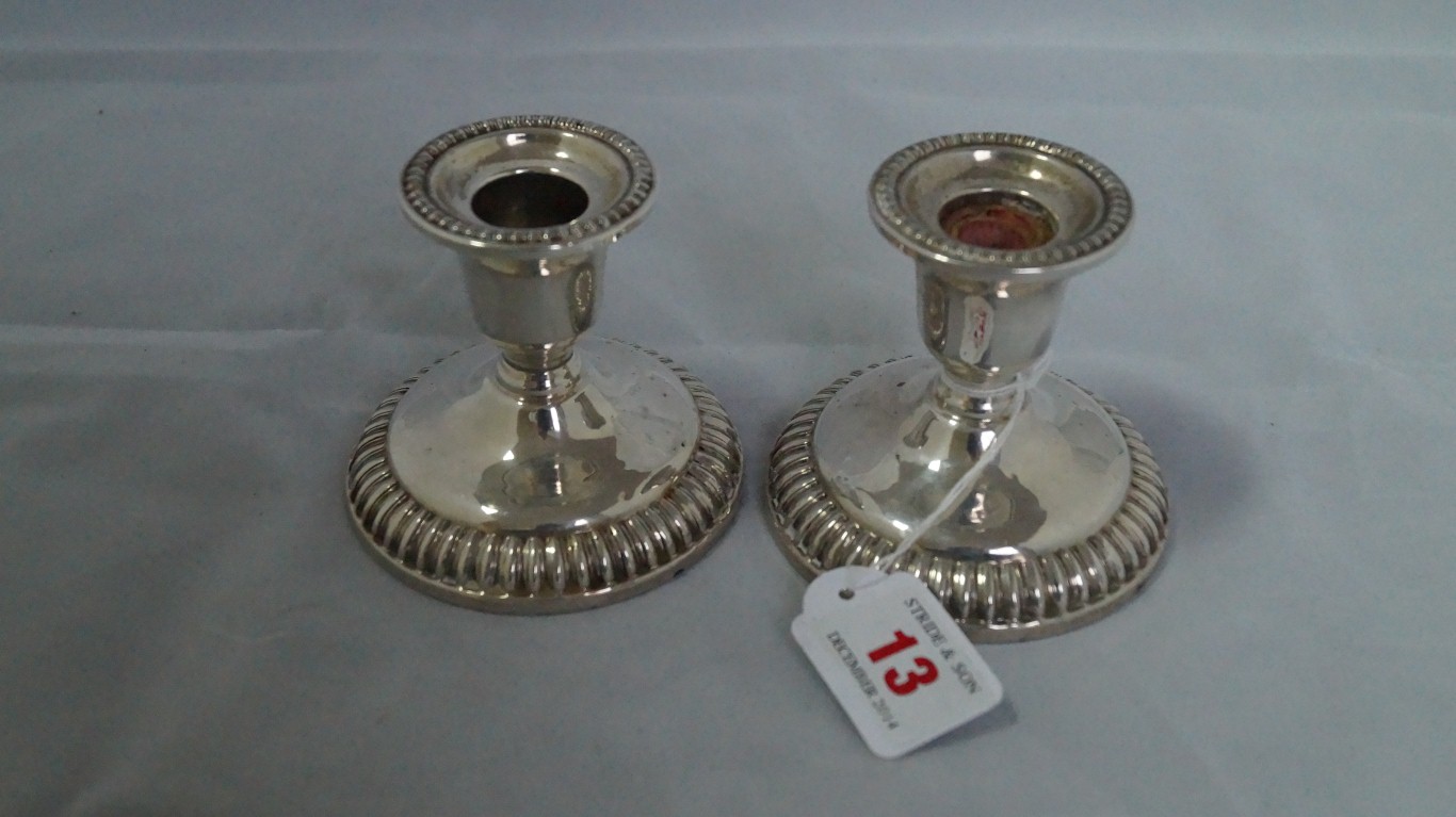 A pair of sterling candlesticks, by 'Bir