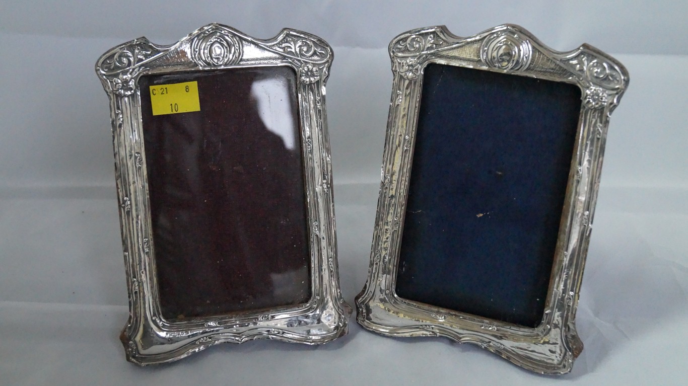 A pair of silver photograph frames, by G