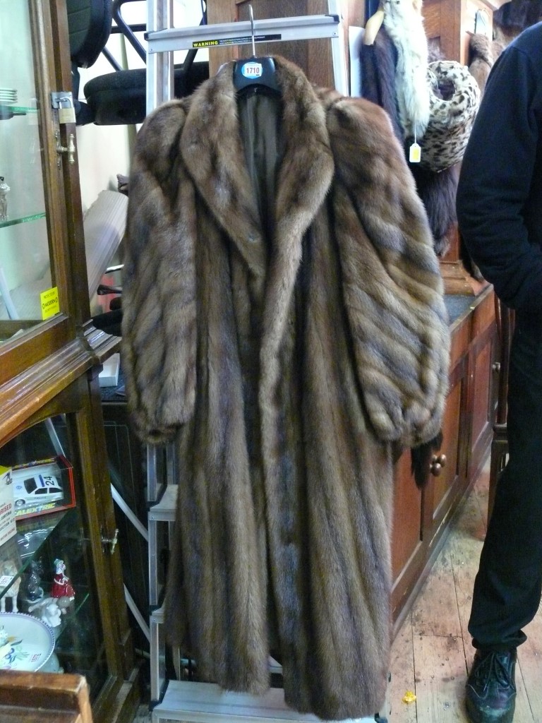 A brown mink full length fur coat.