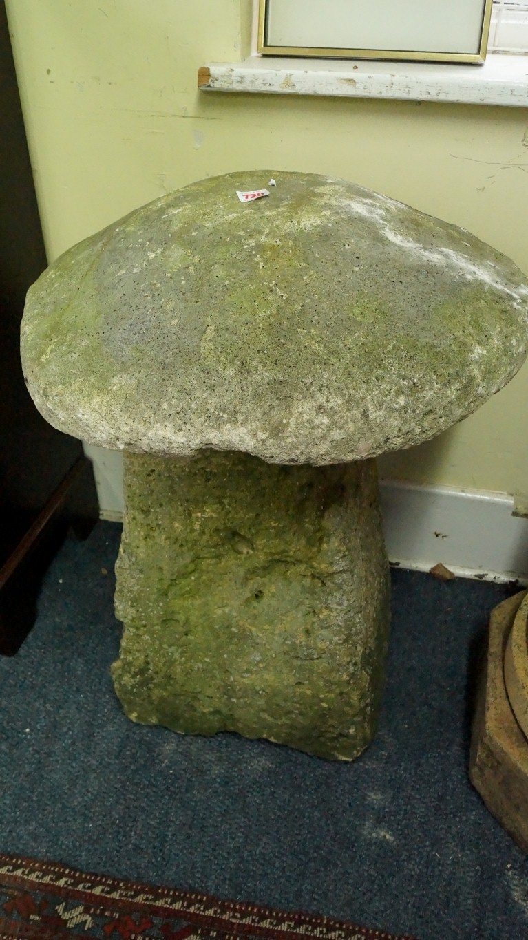 A pair of antique weathered stone staddl