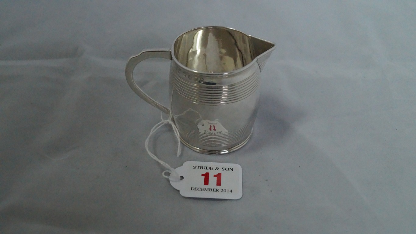 A George III silver cream jug, by Peter
