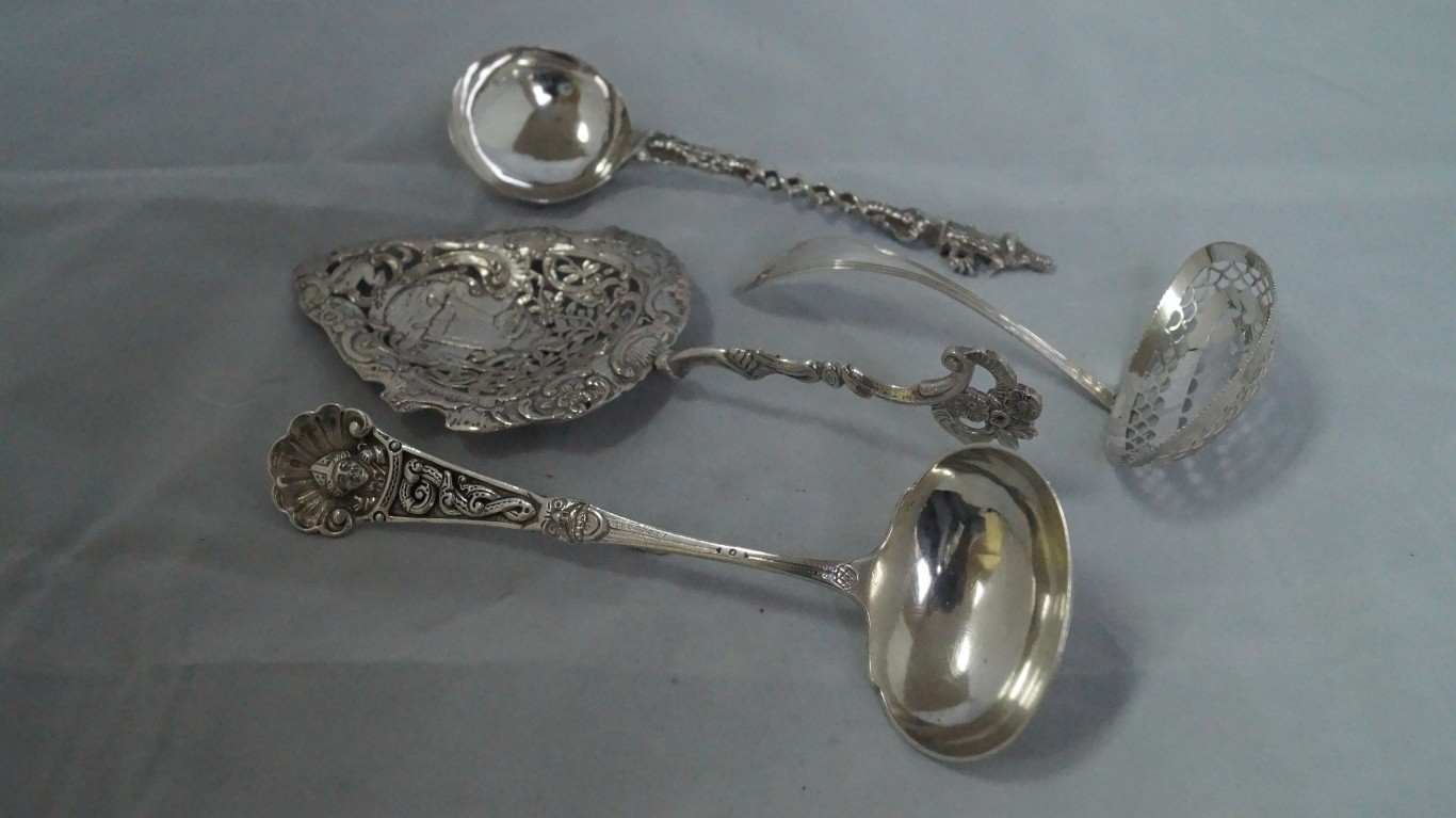 A Continental white metal sifter ladle;