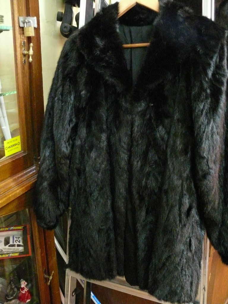 A black mink three-quarter fur coat; tog