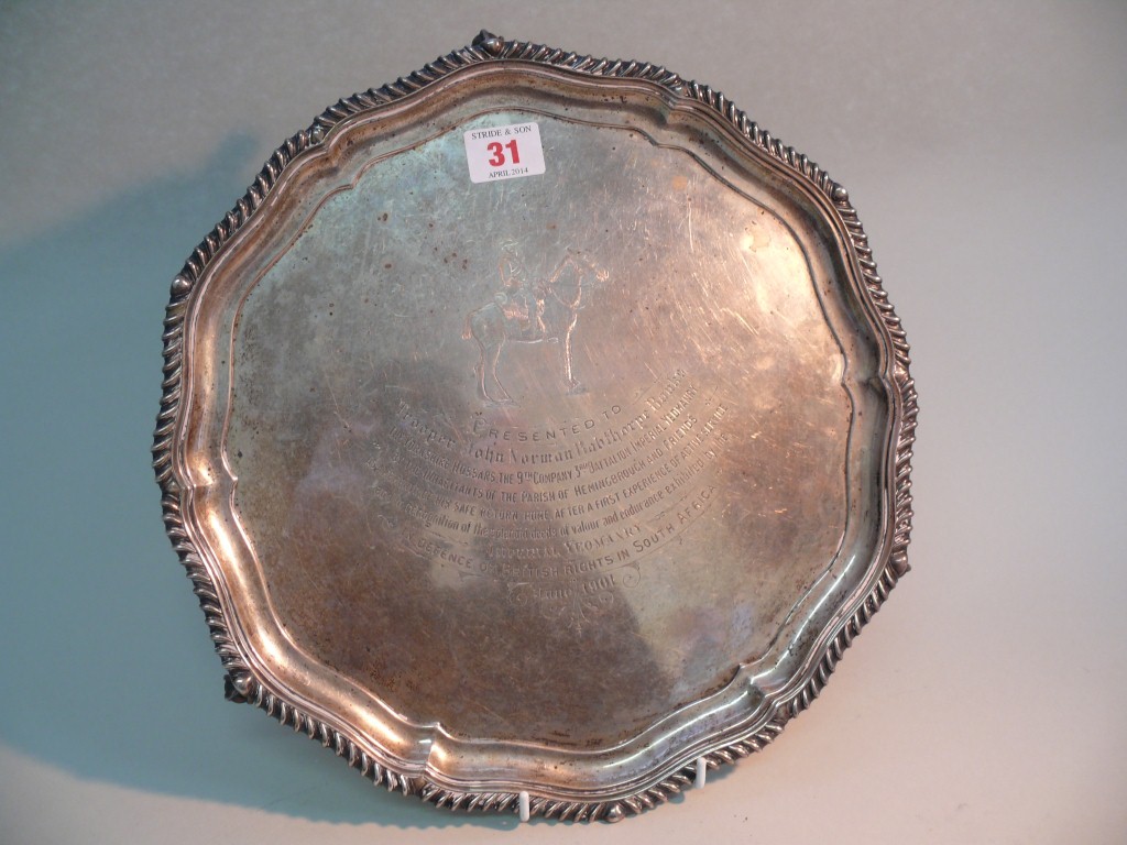 Of Boer War interest: a late Victorian silver salver, by Pearce & Sons, on three claw and ball