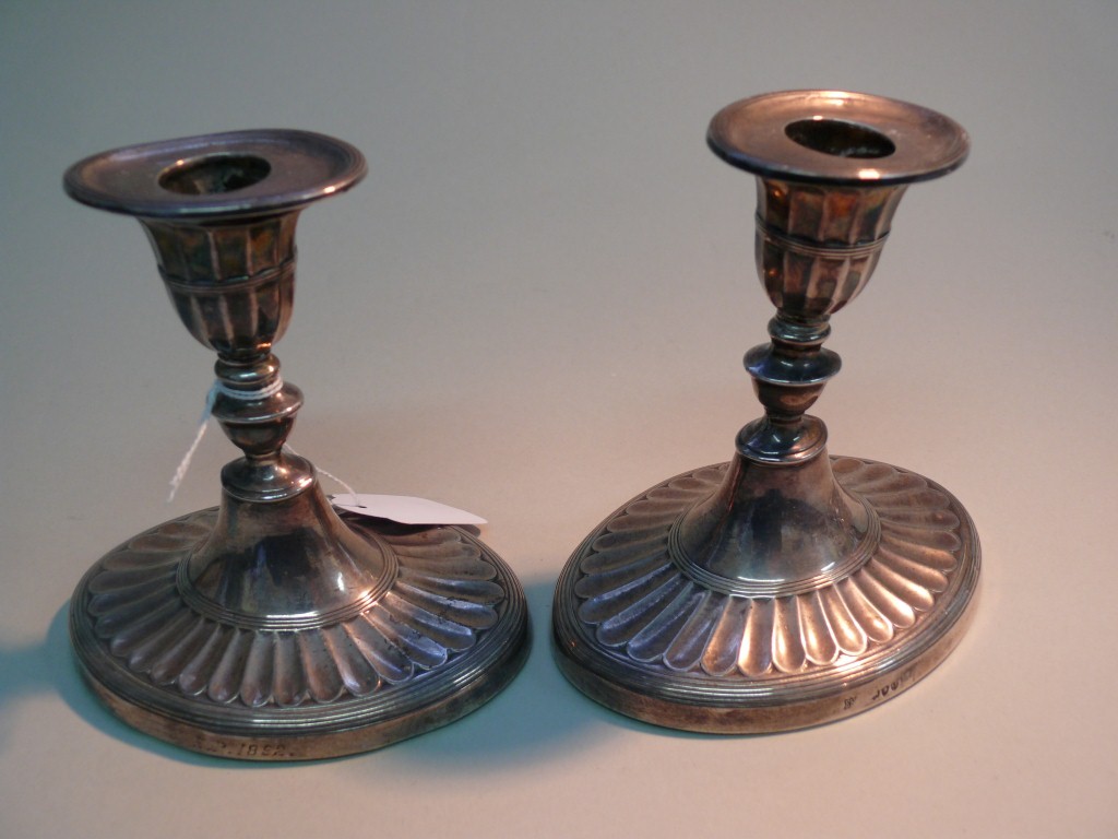 A pair of Victorian silver dwarf candlesticks, by William Hutton & Sons, London 1891, 12.5cm,