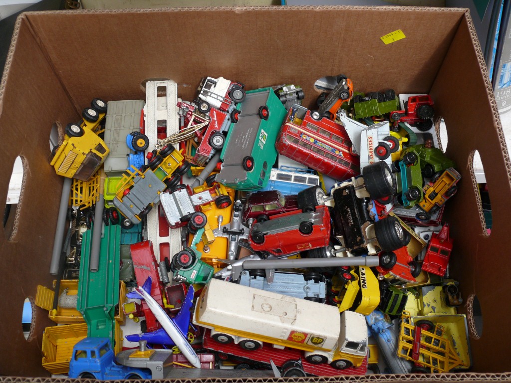 A quantity of Dinky, Corgi and other similar unboxed vehicles.