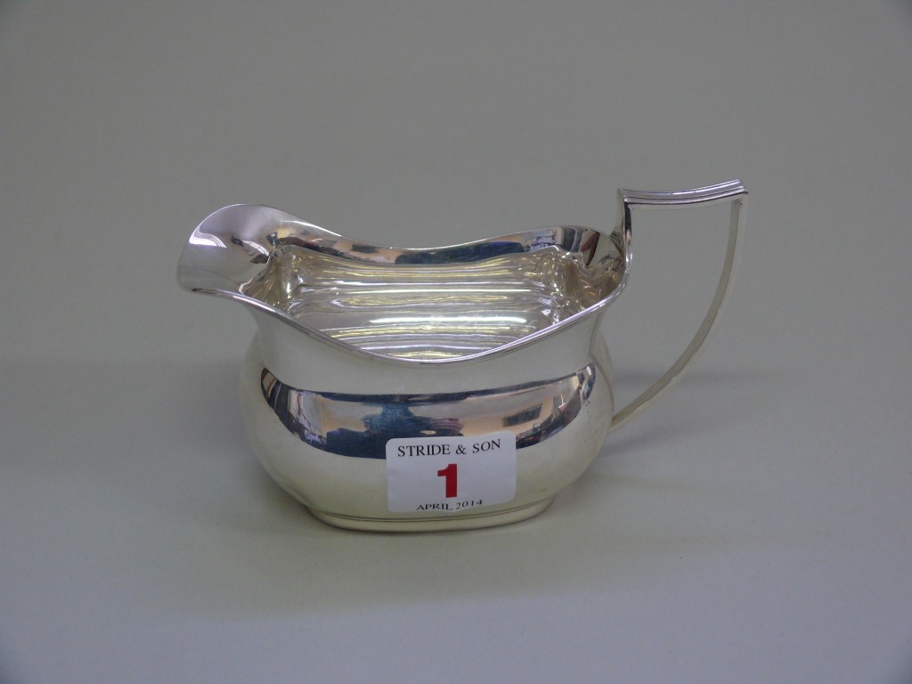 A Georgian style silver sauce boat, by F.W., London 1929, engraved initial C, 4.3oz   Condition