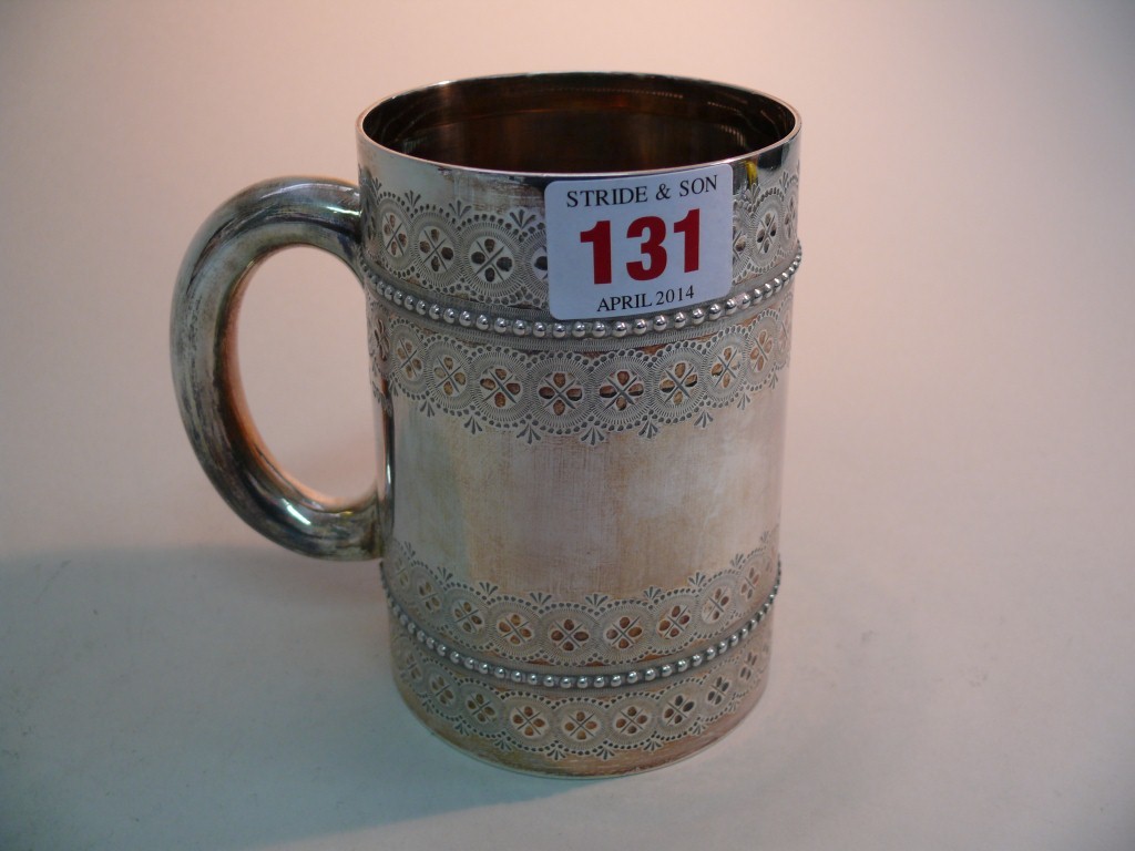 A Victorian silver tankard, by Thomas Bradbury III and John S Henderson, London 1879, having