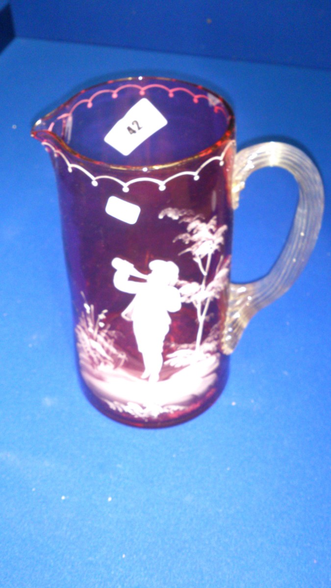 red glass jug
