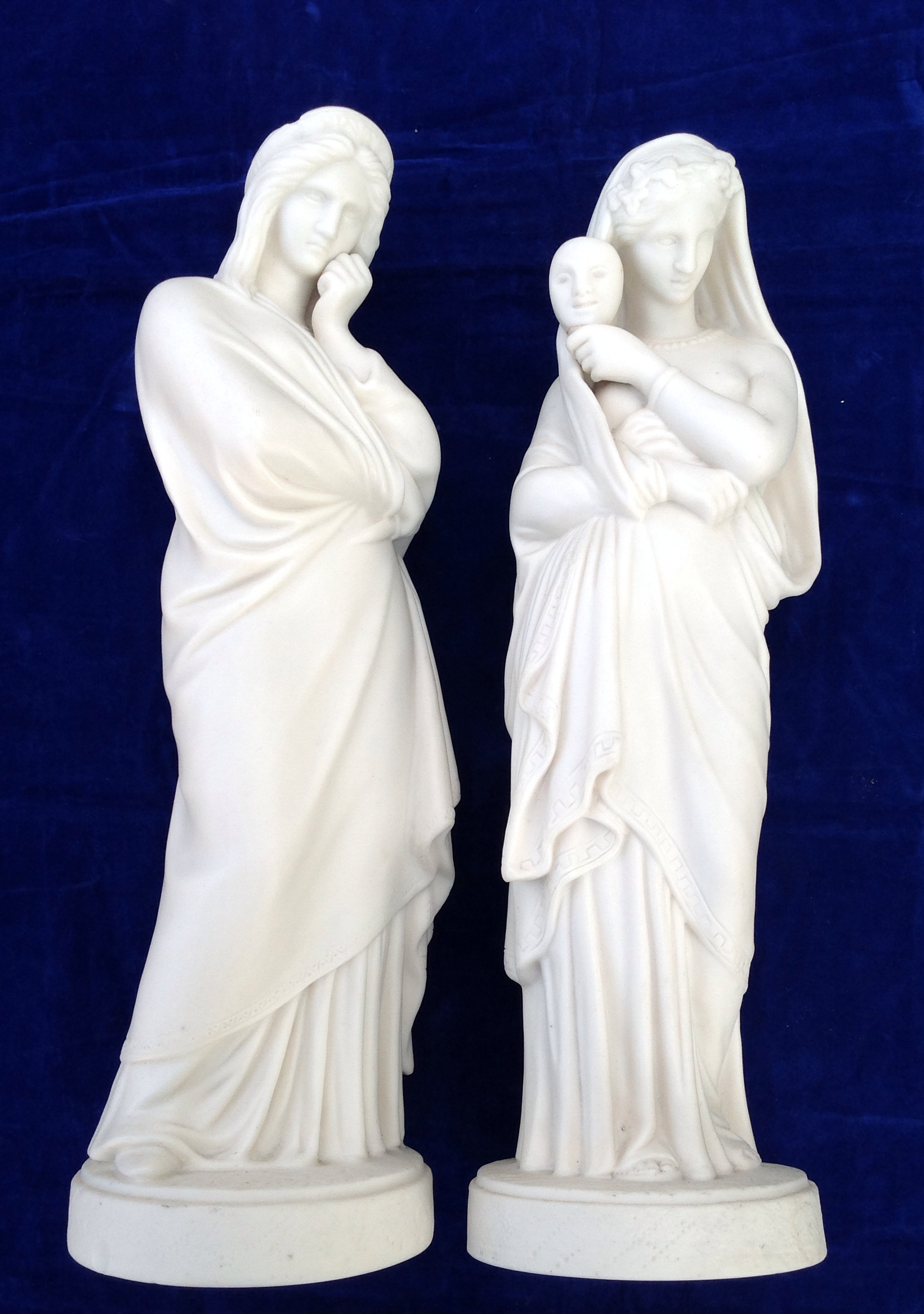 A PAIR OF VICTORIAN PARIAN STATUES Of Roman maidens.