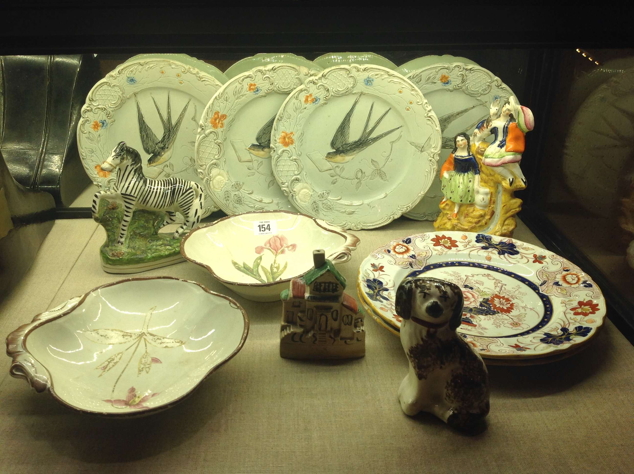 A MIXED LOT OF 19TH CENTURY CHINA To include a Staffordshire zebra Spaniel, group and pastel burner,