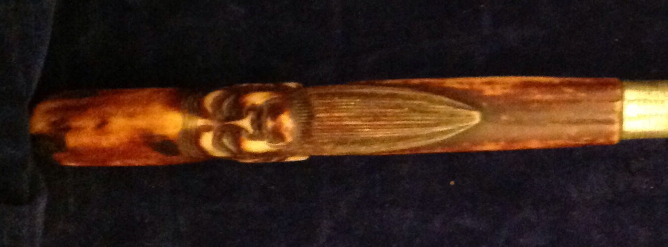 AN ANTIQUE CHINESE IVORY FIGURAL HANDLED KNIFE The handle depicting the Chinese God of Longevity,