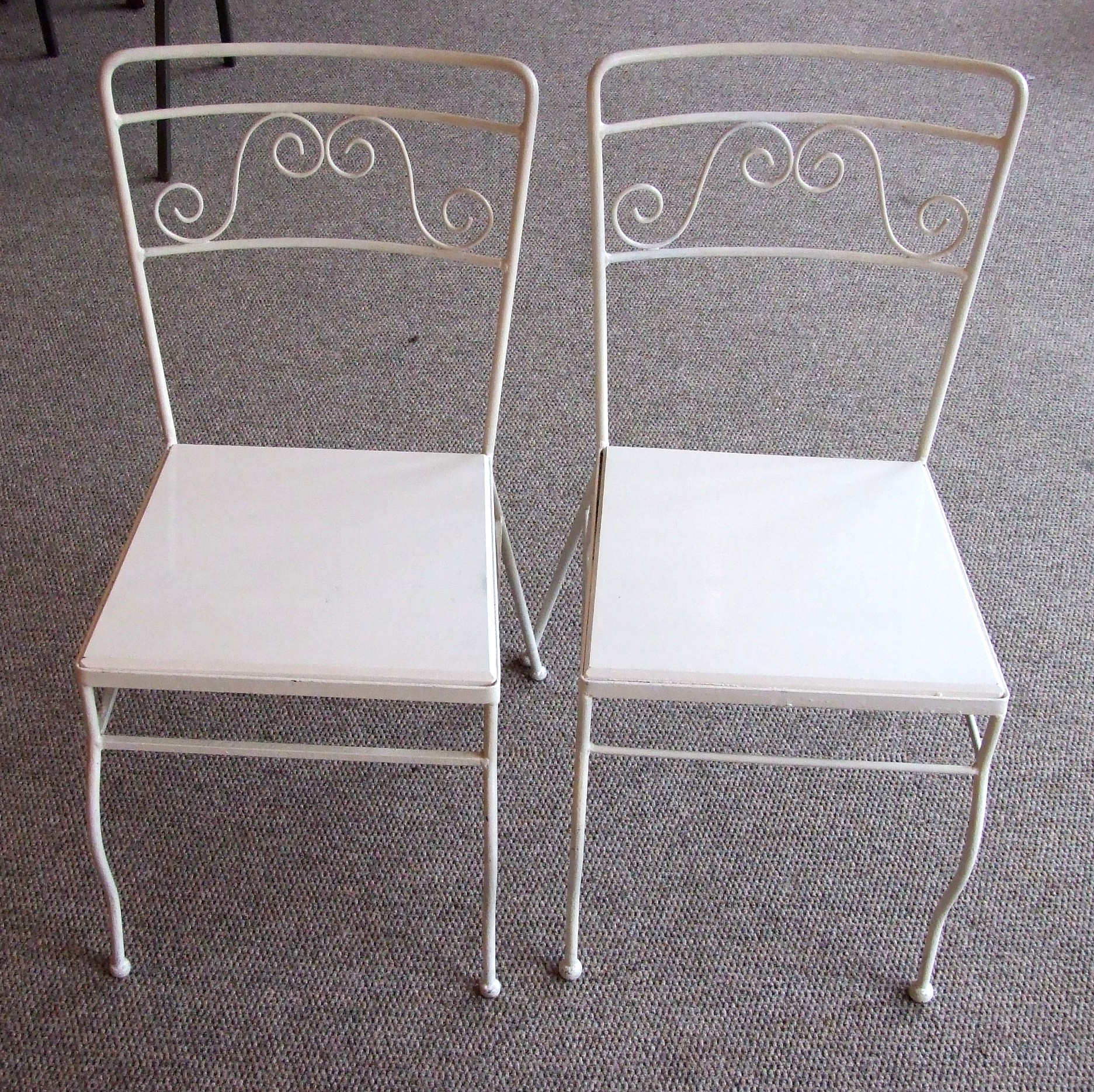 Pair of Wrought Iron Framed Patio Chairs.