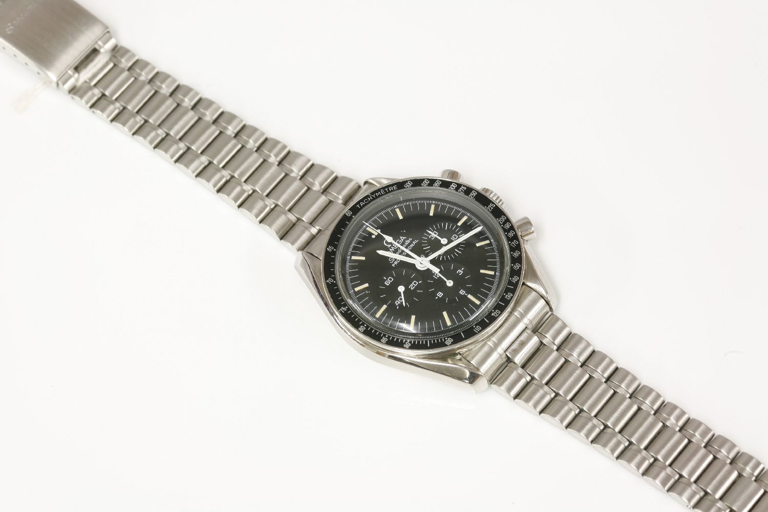 A gentlemen`s stainless steel Omega Speedmaster Professional Moonwatch, with black dial and