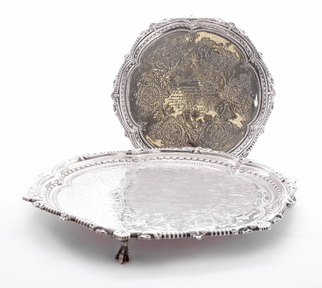 Two Victorian silver graduated salvers,by Martin, Hall & Co, London 1876 and 1882,both of shaped