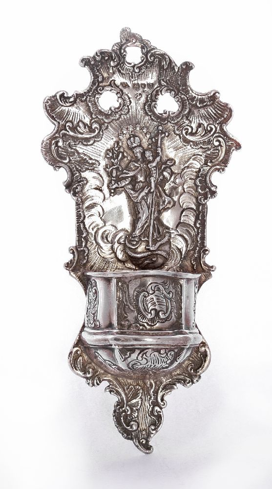A silver water stoup,19th century, with import hallmarks for London 1891,with religious imagery,23.
