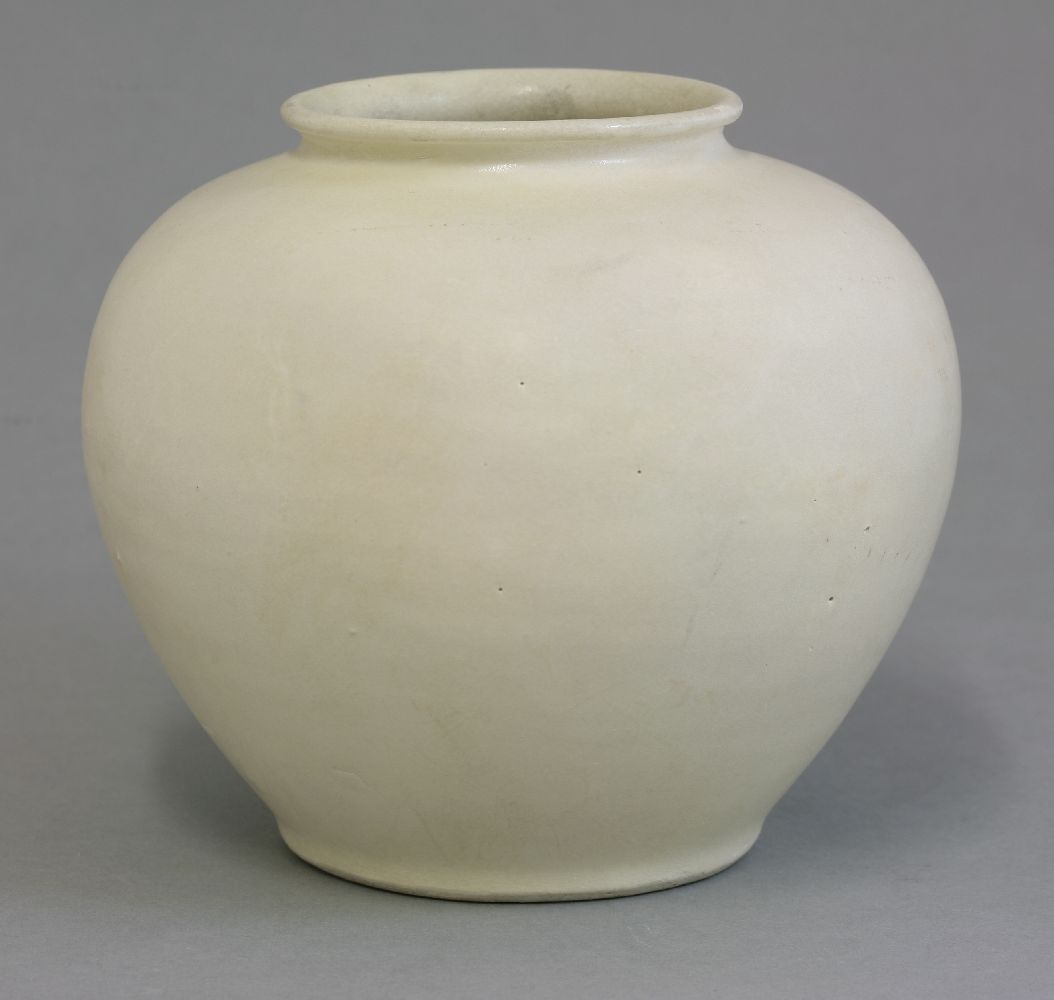 A good cream-glazed Jar,  Tang dynasty (618-906), with thinly potted rim and high shoulders, all
