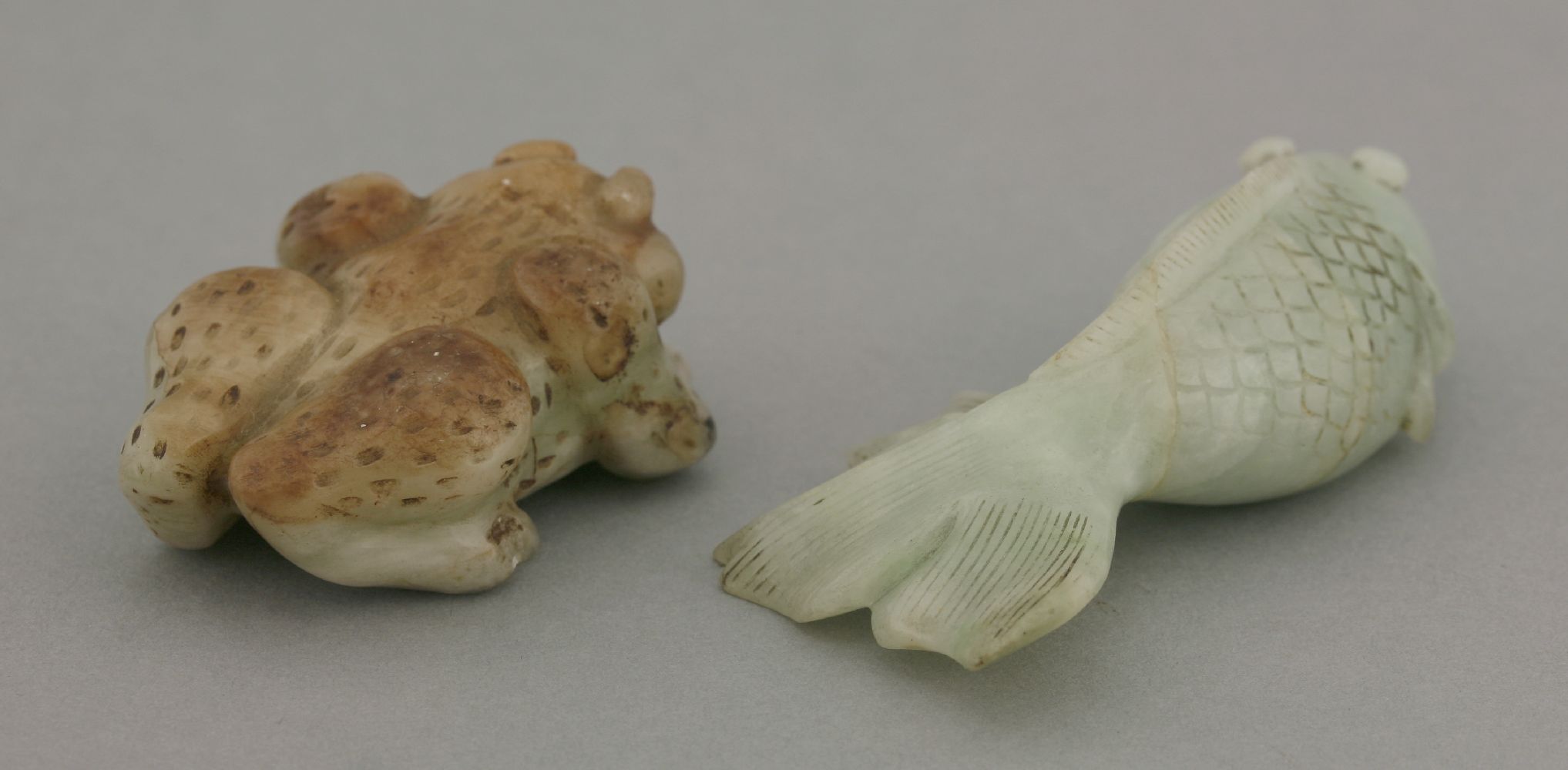 A jade toad, 20th century, with brown upper skin, pale green beneath and flecked overall, 5.5cm, - Image 2 of 2